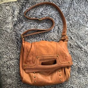 Brown studded leather Lucky’s Brand purse.